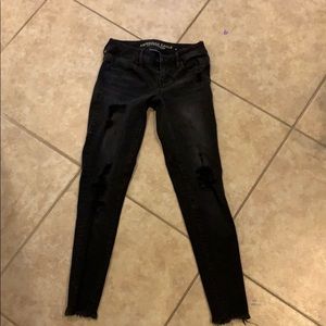 black ripped american eagle jeans